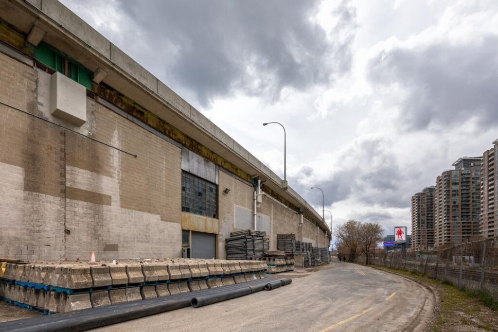 A large outdoor space next to a highway, undeveloped